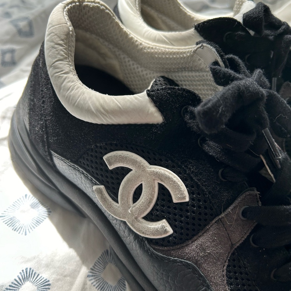 Black and white Chanel sneakers